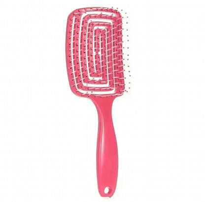 Brosse anti-frisottis utilisée sur cheveux bouclés, démêlage rapide, effet lisse et brillant